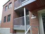 Rénovation complète de l’immeuble : balcons, remplacement de la brique, logements, entrées, portes-fenêtres, murs, ventilation, etc.